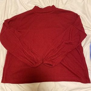 Red turtleneck shirt
